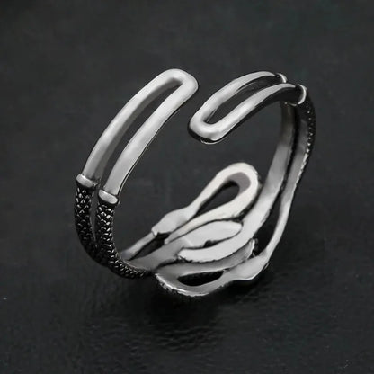 Serpentine Embrace: Twin Cobra Bracelet